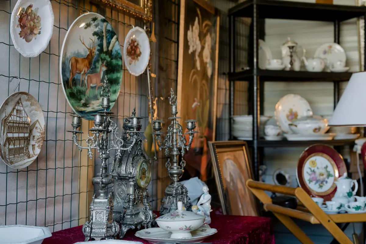 Collection of antique items carefully displayed on a shelf, representing pieces that require careful packing during a move